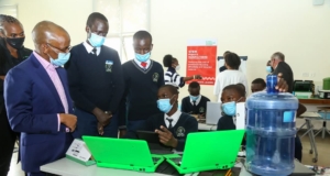 Safaricom CEO Peter Ndegwa with M PESA Foundation