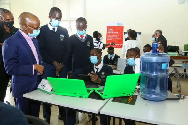 Safaricom CEO Peter Ndegwa with M PESA Foundation Safaricom CEO Peter Ndegwa with M PESA Foundation