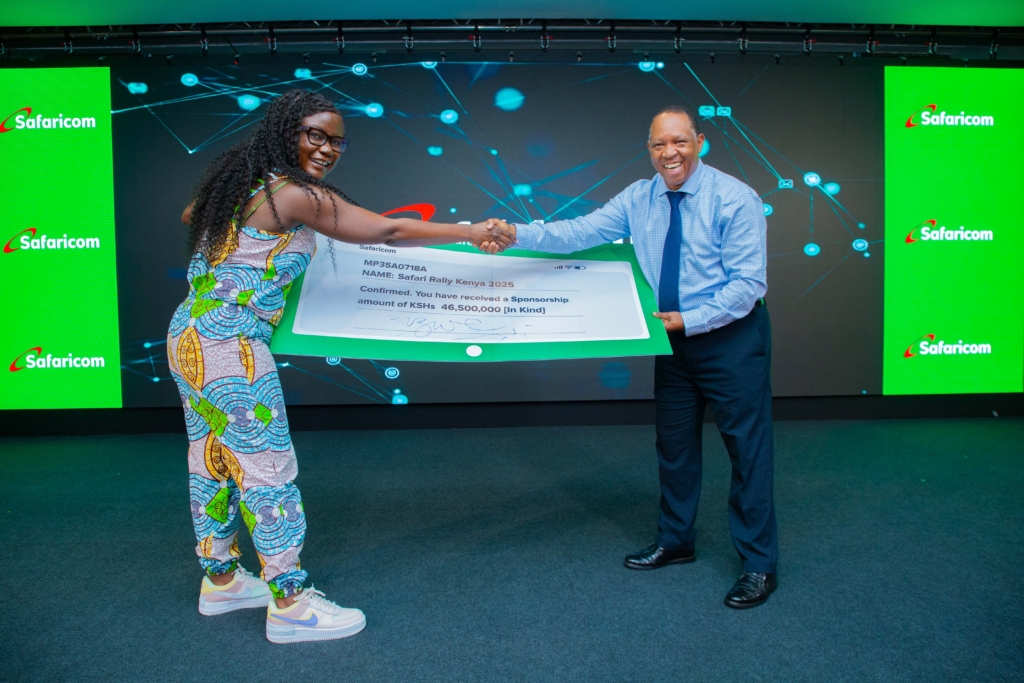 Zizwe Awuor, Director of Branding and Marketing at Safaricom (left), and Charles Gacheru, CEO of WRC Safari Rally Kenya (right), during the cheque handover ceremony for the Safaricom WRC Safari Rally 2025 Sponsorship, where Safaricom announced a KES 46.5 million investment to support the event