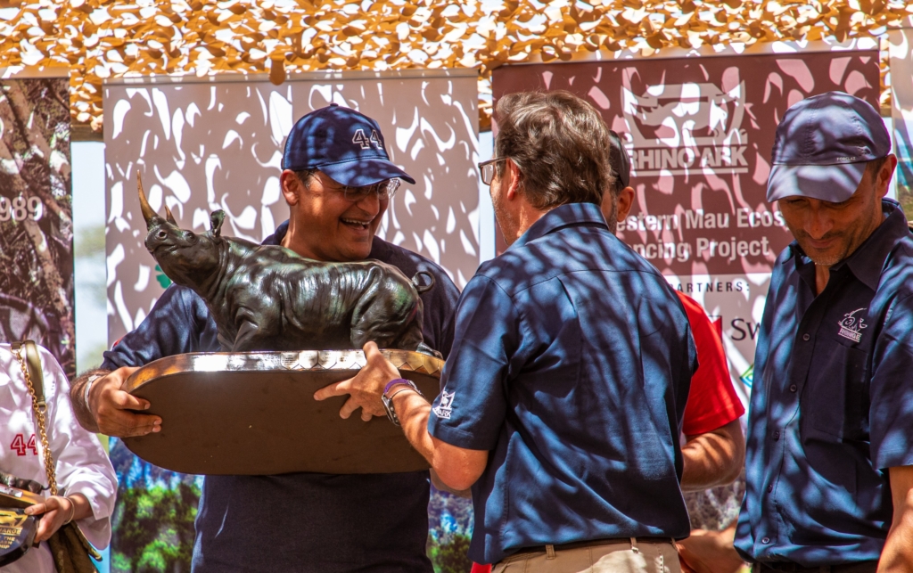 Adil Khawaja of Car No. 44 (left) receives the Top Fundraiser award from Christian
Lambrechts, Executive Director at Rhino Ark (right), during the awards ceremony at the 2025 Rhino Charge Challenge, held at Saimo Soi in Baringo North.