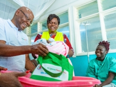 M-Pesa Foundation Medical Camps Bring Free Healthcare to Over 6,500 in Homa Bay and Busia Joseph Ogutu, Safaricom Foundation Chairman, and H.E. Hon. Gladys Wanga, CBS, Governor of Homa Bay County, present a Mama Pack from the M-Pesa Foundation to Ivene Obuya, a new mother, at the Homa Bay County Referral and Teaching Hospital during the M-Pesa Foundation medical camp in Homa Bay