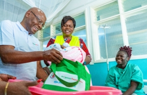M-Pesa Foundation Medical Camps Bring Free Healthcare to Over 6,500 in Homa Bay and Busia Joseph Ogutu, Safaricom Foundation Chairman, and H.E. Hon. Gladys Wanga, CBS, Governor of Homa Bay County, present a Mama Pack from the M-Pesa Foundation to Ivene Obuya, a new mother, at the Homa Bay County Referral and Teaching Hospital during the M-Pesa Foundation medical camp in Homa Bay