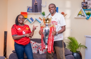 Arsenal Legend Nwankwo Kanu Thrills Fans as Guinness Premier League Trophy Tour Arrives in Kenya Man United fan Ann Njoroge hosts the Premier League Trophy and former Arsenal player Nwankwo Kanu at her home